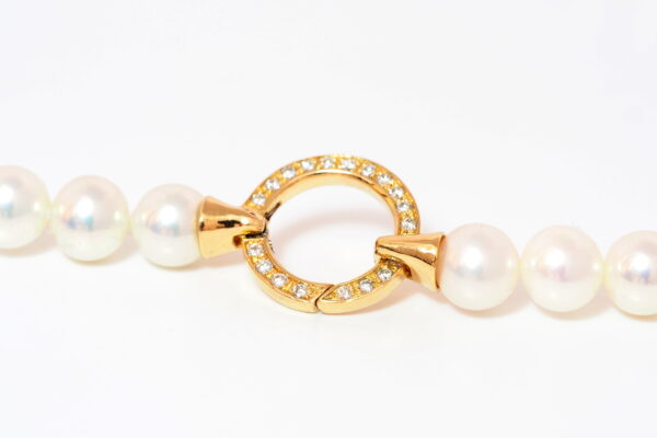 Pearl necklace with diamonds 19.2Kt gold